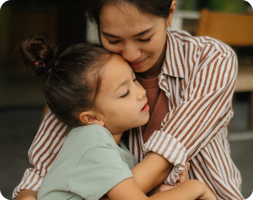 Woman and child hugging